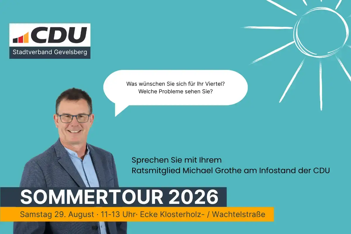 Das Bild zeigt Michael Grothe und ein Banner: Sommertour